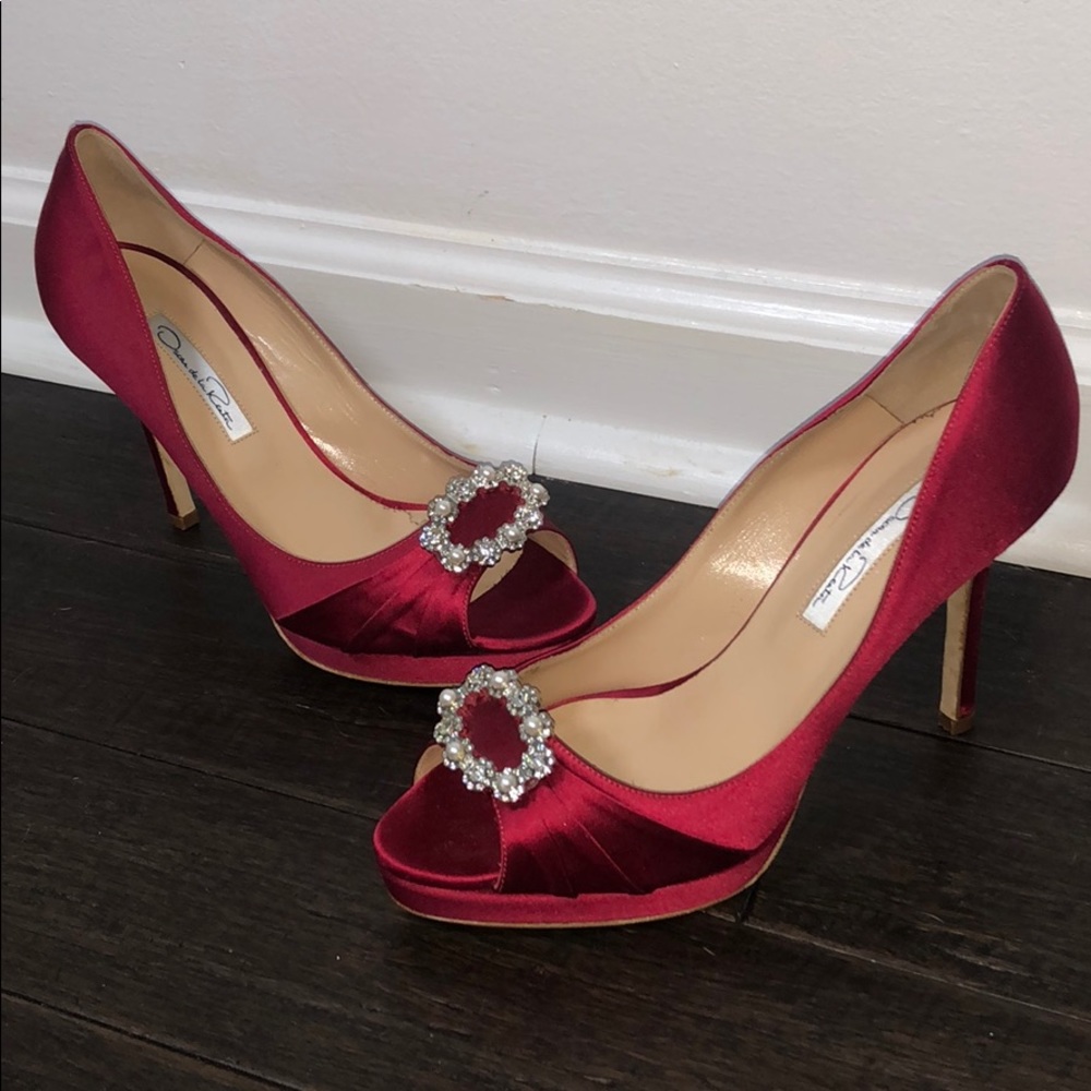 Red satin peep toe high heel with broach